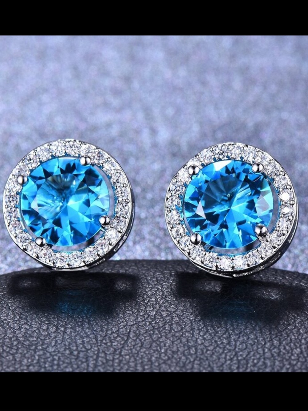 Silver Halo Stud Earrings with Blue Crystal Center